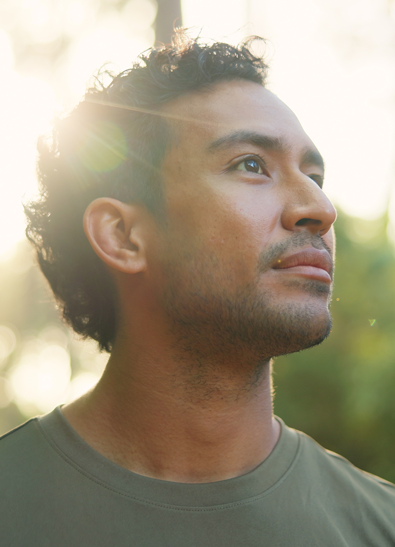 Man practicing mindfulness out in nature in Ithaca
