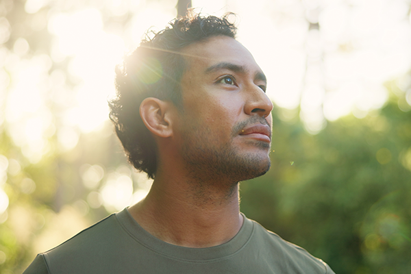 Man practicing mindfulness in nature in New York